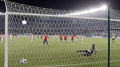 Roberto Cereceda slots home Chile’s opening goal from the penalty spot in a 2-0 win for the visitors against the UAE last night.
