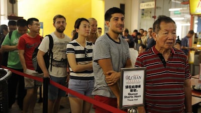 Long queues form daily as his customers, both locals and tourists, wait in line.