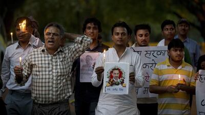 Indian journalists hold a candlelight vigil in memory of freelance journalist Jagendra Singh in New Delhi on June 12, 2015. Singh was attacked and set on fire after accusing a state minister of illegal activities. Saurabh Das / AP Photo