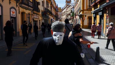 Workers from the entertainment sector protest against the lack of support a year after the coronavirus disease forced a national lockdown, in Seville, Spain. Reuters