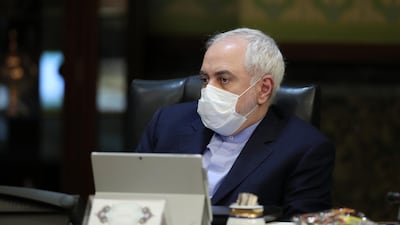 Iranian Foreign Minister Javad Zarif wears a protective mask during a cabinet meeting in the capital Tehran. AFP