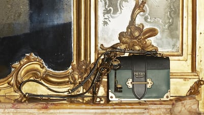 Prada colour-blocked bags with gold hardware, available from July 15 online at Mytheresa.com. Courtesy of Mytheresa.com