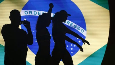 Agatha and Barbara of Brazil are silhouetted as they enter the field during the women’s Beach Volleyball Final match of the Rio 2016 Olympic Games between Ludwig/Walkenhorst of Germany and Agatha/Barbara of Brazil at the Beach Volleyball Arena on Copacabana Beach in Rio de Janeiro, Brazil. Orlando Barria / EPA