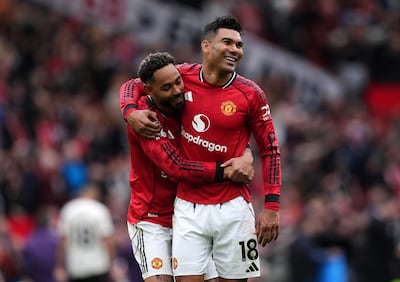 Manchester United's Matheus Cunha, left, has lauded the impact of teammate Casemiro, who will leave the club at the end of the season. PA