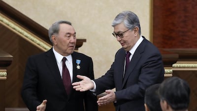 Acting President of Kazakhstan Kassym-Jomart Tokayev and his predecessor Nursultan Nazarbayev attend a joint session of the houses of parliament in Astana. Reuters