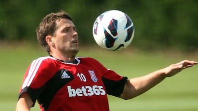 Michael Owen working at Stoke's training complex.