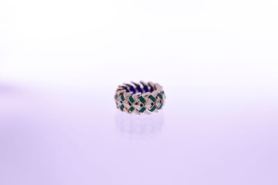Palm Weave ring made of gold with ceramic inlay. Khushnum Bhandari / The National