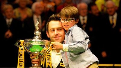 Ronnie O'Sullivan may have won the world snooker championship, but he is not certain about coming back next season. Paul Ellis / AFP