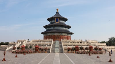Workers clean the grounds at the Temple of Heaven park in Beijing, China. Getty Images