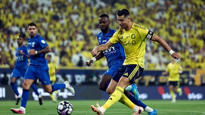 Al Nassr's Cristiano Ronaldo shoots at goal. Reuters