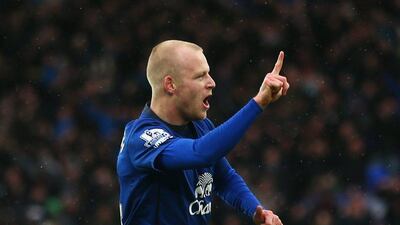 Steven Naismith of Everton celebrates as he scores the opening goal in a 2-2 Premier League draw with Leicester City on Sunday at Goodison Park. Clive Brunskill / Getty Images