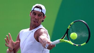 Rafael Nadal underwent a gruelling training session to test his troubled left wrist and has confirmed he will take part in the Olympic Games. Roberto Schmidt / AFP