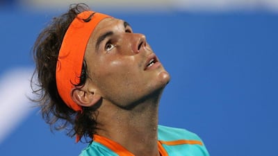 Rafael Nadal reacts during his match against Stan Wawrinka during the Mubadala World Tennis Championship on Saturday in Abu Dhabi. Kamran Jebreili / AP / January 3, 2015