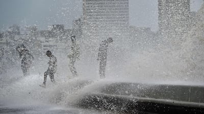 TV footage has shown gridlock across Mumbai as the roads were flooded. AFP