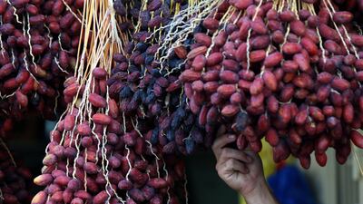 Dates are displayed for sale on the eve of Islam's holy fasting month of Ramadan in the West Bank city of Jericho on July 31, 2011. AFP PHOTO/ABBAS MOMANI *** Local Caption *** 530247-01-08.jpg