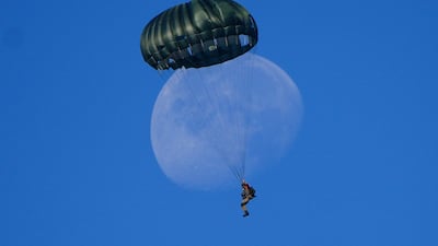 Paratroopers from eight Nato member countries - Germany, Greece, Netherlands, Poland, Portugal, Spain, UK, and the US - jump on to Ginkel Heath in Ede, Netherlands. PA