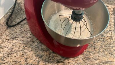 After two to three minutes your cream will have thickened and look whipped. Keep going. Farah Andrews / The National