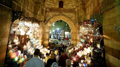 People walk at the popular tourist area "Khan el-Khalili" in the Al Hussein and Al-Azhar districts in old Islamic Cairo. Egypt plans to expand current capacity of 89,993 hotel rooms to a total of 238,114 rooms by constructing 55,121 rooms in touristic areas and an additional 183,000 rooms subject to the Tourism Development Authority. Reuters