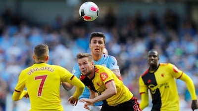 Manchester City's Rodri in action with Watford's Tom Cleverley. Reuters