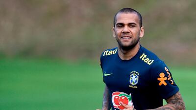 Brazil defender Dani Alves takes part in a training session at Cidade do Galo, in Belo Horizonte. AFP