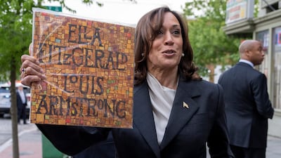 US Vice President Kamala Harris shows records she bought at Home Rule Record store in Washington, DC. EPA