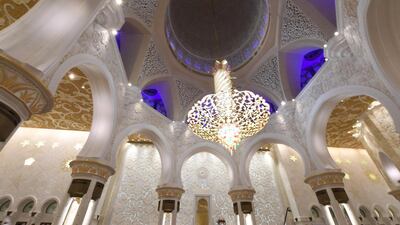 Worshippers pray inside Abu Dhabi's Sheikh Zayed Grand Mosque on the last Friday of Ramadan. Karim Sahib / AFP