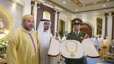 Sheikh Mohammed bin Zayed, Crown Prince of Abu Dhabi and Deputy Supreme Commander of the Armed Forces, presents the Order of Zayed to King Mohammed VI of Morocco at a reception in Mushrif Palace. Mohamed Al Hammadi / Crown Prince Court – Abu Dhabi