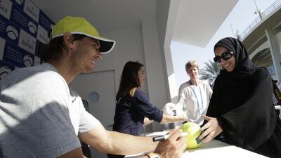 Rafael Nadal spent Day 1 of the tournament meeting fans and signing autographs. He begins his Mubadala campaign at the semi-final stage against fellow Spaniard David Ferrer. Ali Haider / EPA