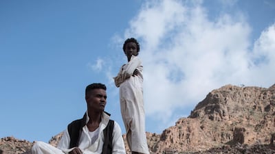 Hamad and a child from the Bishara tribe pose for a photograph: There are two indigenous tribes that live by Gabal Elba in the winter and spring seasons — the Bishara and the Ababda. Members of the Rashayda tribe can also be found in the region, but to a lesser degree and they are not considered indigenous to the protected area. Photo / Jihad Abaza