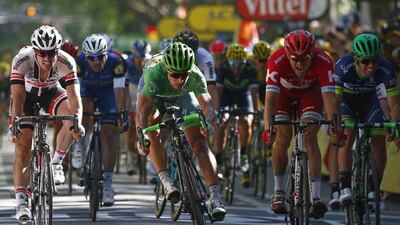 Peter Sagan of Slovakia, wearing the best sprinter's green jersey, crosses the finish line ahead of Norway’s Alexander Kristoff, center right, to win Stage 16 of the Tour de France cycling race over 209 kilometers with start in Moirans-en-Montagne and finish in Bern, Switzerland, Monday, July 18, 2016. (AP Photo/Peter Dejong)