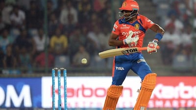 Gujarat Lions' batsman Dwayne Bravo plays a shot during the 2016 Indian Premier League (IPL) T20 cricket match between Delhi Daredevils and Gujarat Lions at The Feroz Shah Kotla Stadium in New Delhi on April 27, 2016. AFP / SAJJAD HUSSAIN