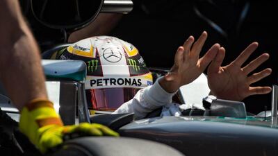 British Formula One driver Lewis Hamilton of Mercedes-GP stretches his fingers during the qualifying session of the Monaco Formula One Grand Prix at the Monte Carlo circuit in Monaco, 28 May 2016. The 2016 Formula One Grand Prix of Monaco will take place on 29 May 2016. EPA/ANDREJ ISAKOVIC