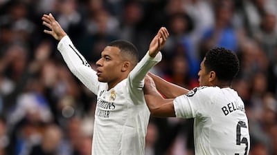 Real Madrid's Kylian Mbappe celebrates scoring with teammate Jude Bellingham. Getty Images