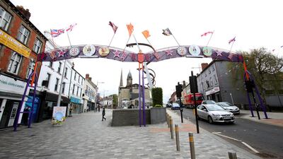 Lisburn and other unionist strongholds have mounted centenary arches to celebrate the establishment of the Protestant dominated state but the jockeying for power among NI politicians has hogged the headlines. Paul McErlane