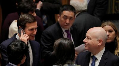 Jared Kushner, on phone, and Jason Greenblatt, right, will embark on their trip to the Midle East in late February. REUTERS