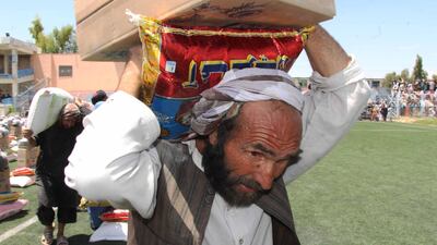 A man receives free rations in Kandahar, Afghanistan. EPA