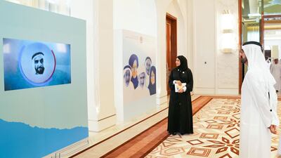 Sheikh Mohammed bin Rashid watches a presentation about the new National Policy for Senior Emiratis during a cabinet meeting. Wam