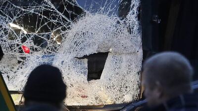 The smashed window of the cabin of a lorry which ran into a crowded Christmas market on December 19 in Berlin. German prosecutors said they have detained a Tunisian man they think may have been involved in last week's attack. AP Photo/Markus Schreiber