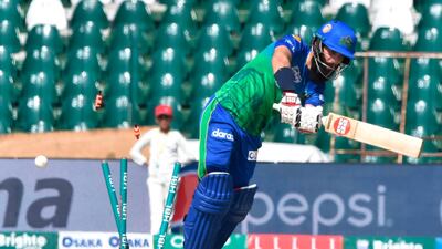 Multan Sultans batsman Moeen Ali is clean bowled during the Pakistan Super League match against Lahore Qalandars. AFP