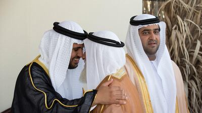 Sheikh Diab greets a guest at his wedding reception. Seen with Sheikh Mohammed bin Hamdan.
