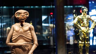 Artifacts of cinema, from films such as 'Star Wars' and 'ET' are displayed. AFP