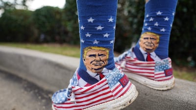 Stars, stripes and socks: Donald Trump's image is printed on a man's socks in South Carolina. Getty / AFP