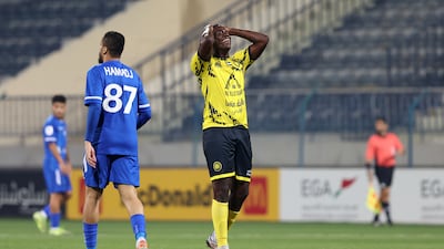 Mario Balotelli holds his head after a missed opportunity.