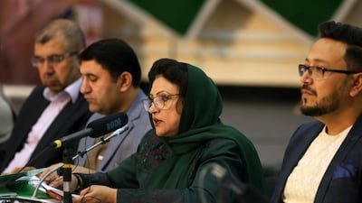 Hawa Alam Nuristani (2-R) head of the Independent Election Commission of Afghanistan (IEC) talks with journalists during a press conference in Kabul. EPA
