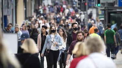 Shoppers in Princes Street, Edinburgh. The UK economy rebounded 7.5 per cent last year. PA