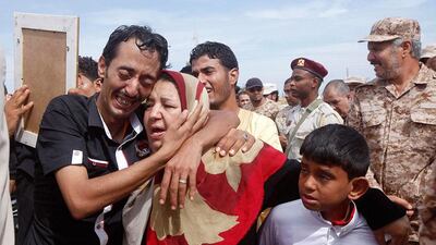 Relatives of one of the soldiers who was killed, during an attack at a checkpoint near the city of Bani Walid, mourn during an official military memorial ceremony, in Tripoli, Libya. Ismail Zitouny / Reuters