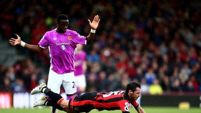Adam Smith of Bournemouth goes to ground after a challenge by Adama Diomande of Hull City during their match at Vitality Stadium on October 15, 2016 in Bournemouth. Jordan Mansfield / Getty Images