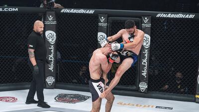 Shakriyor Juraev lands a flying knee on Bahez Khoshnaw in the UAE Warriors 19 Arabia 3 at the Jiu-Jitsu Arena. Courtesy UAE Warriors