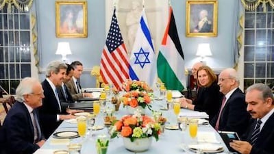 US secretary of state John Kerry (second from left) hosts an Iftar for Israeli justice minister Tzipi Livni (third from right) and Palestinian chief negotiator Saeb Erekat (second from right) at the US Department of State in Washington, DC.