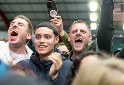 Jeremy Corbyn supporters celebrate as he is declared the winner. EPA